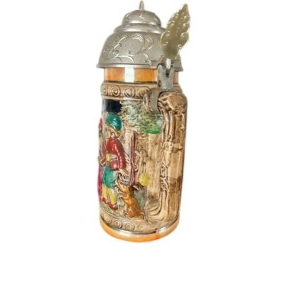 Vintage German musical beer stein,  embossed painted scenes, hinged pewter lid